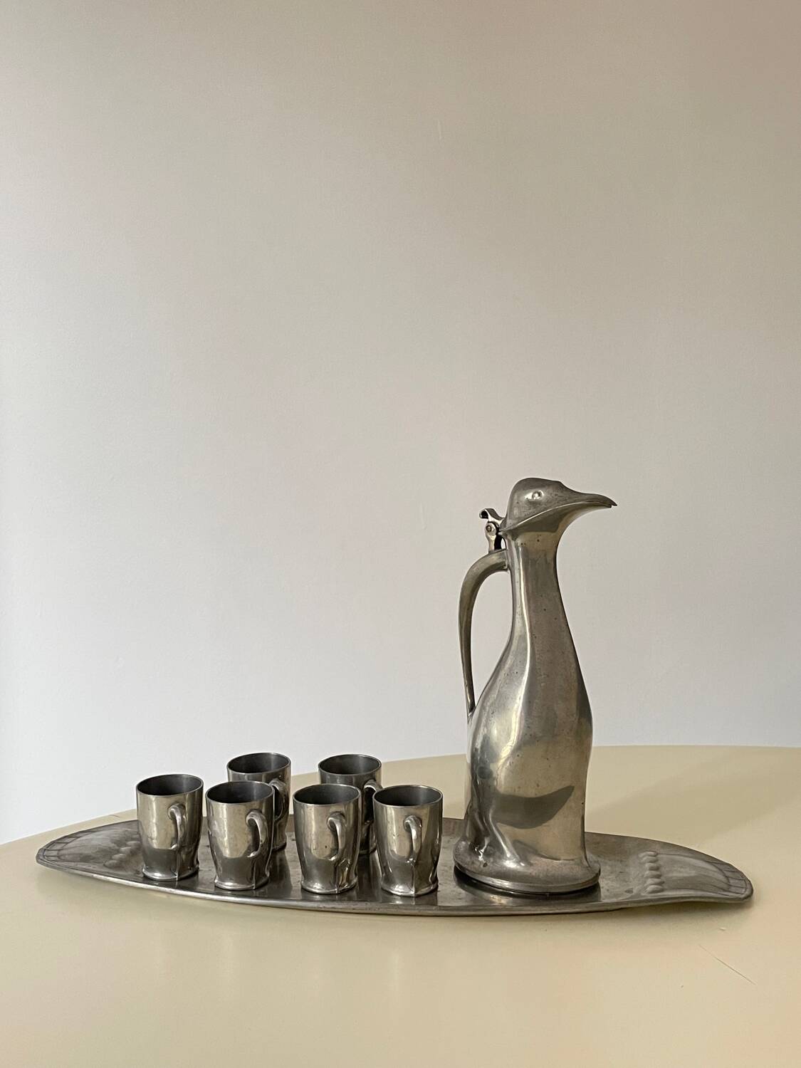 Polished pewter penguin-shaped carafe designed by Hugo Leven for Kayserzinn