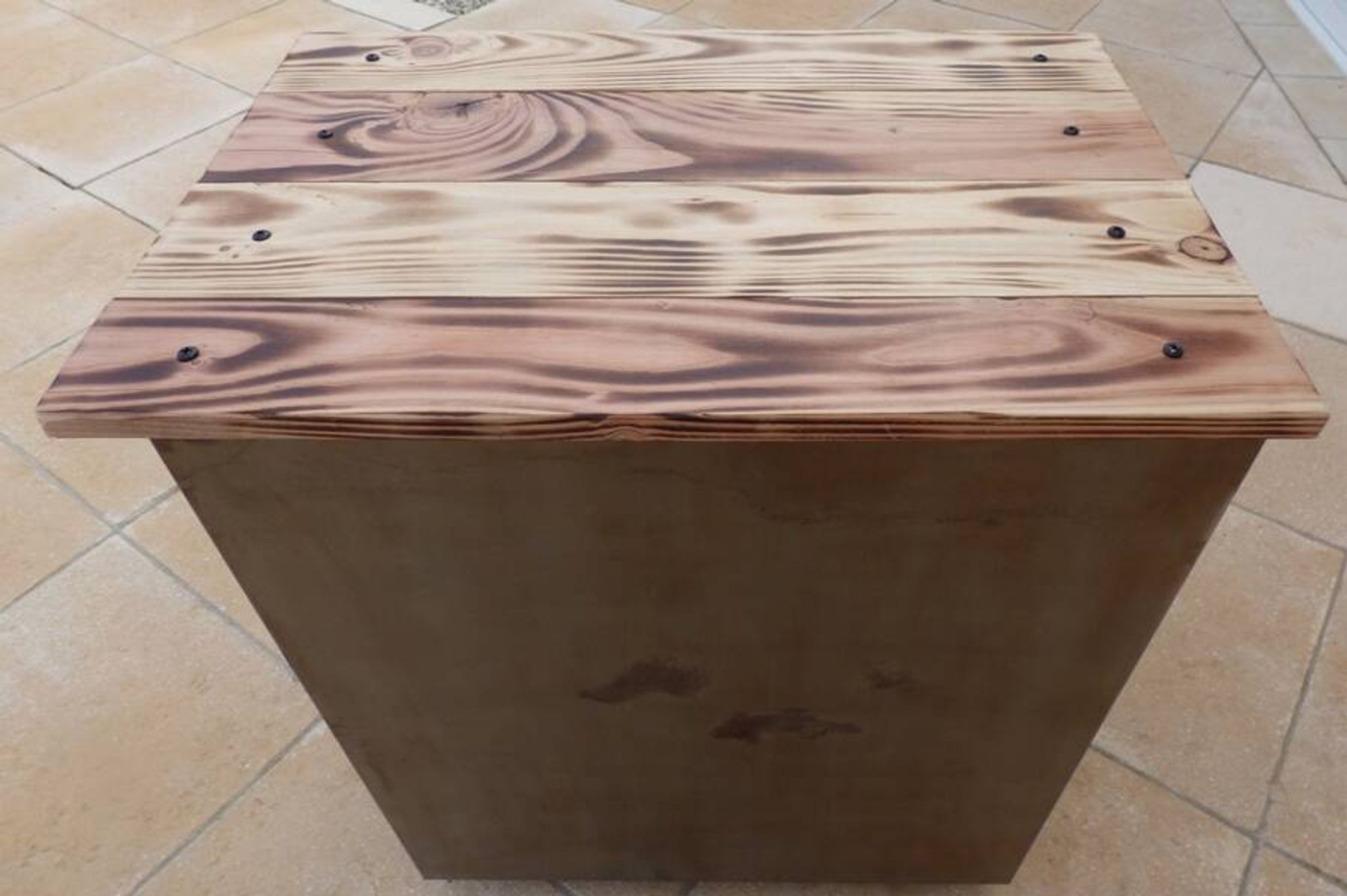 Vintage industrial metal furniture with a rusty effect, featuring two drawers on wheels.