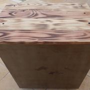 Vintage industrial metal furniture with a rusty effect, featuring two drawers on wheels.