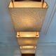 Wood and copper metal floor lamp with parchment.