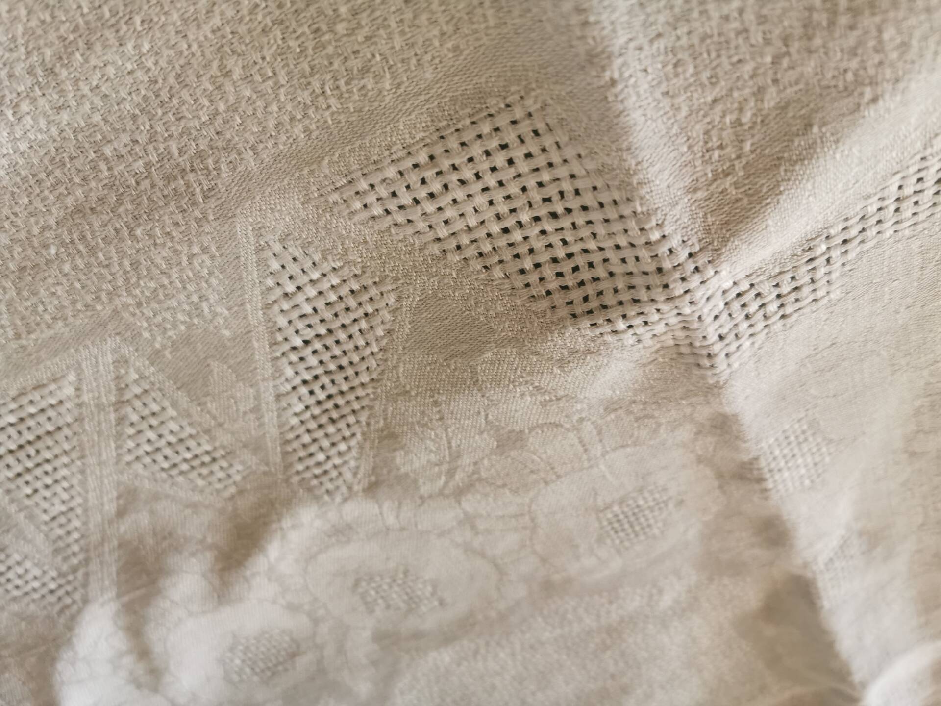 Set of 16 table napkins and an old floral damask tablecloth.