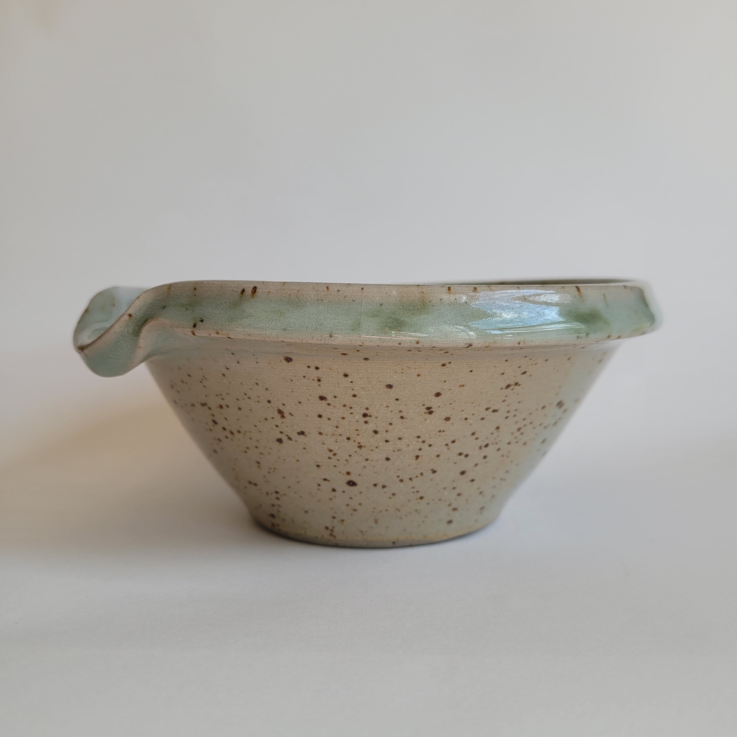 Bowl spout in sandstone