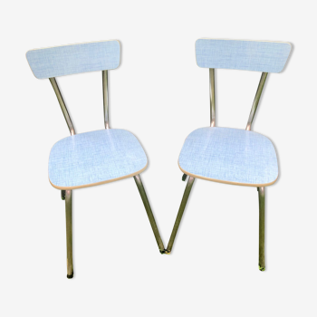 2 blue formica chairs