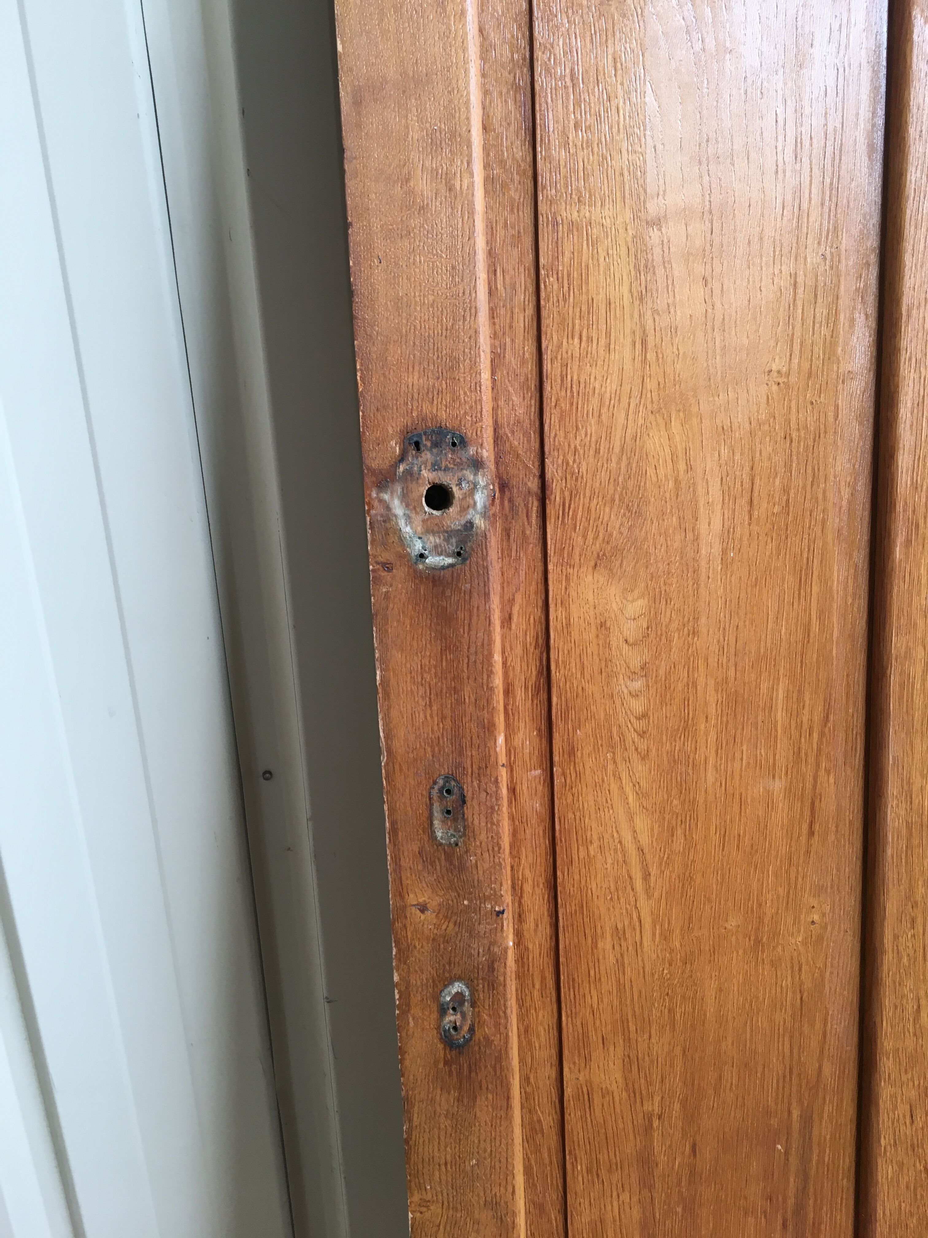 old sanitary door of the bank of France in oak