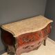Curved commode with marquetry and marble top.