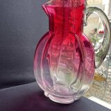 Colored blown glass jug attributed to Legras