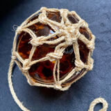 Marine float in glass and rope