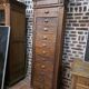 11-drawer solid oak craft cabinet