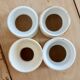 4 mismatched vintage diabolo egg cups in earthenware