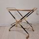 Serving table in brass wood