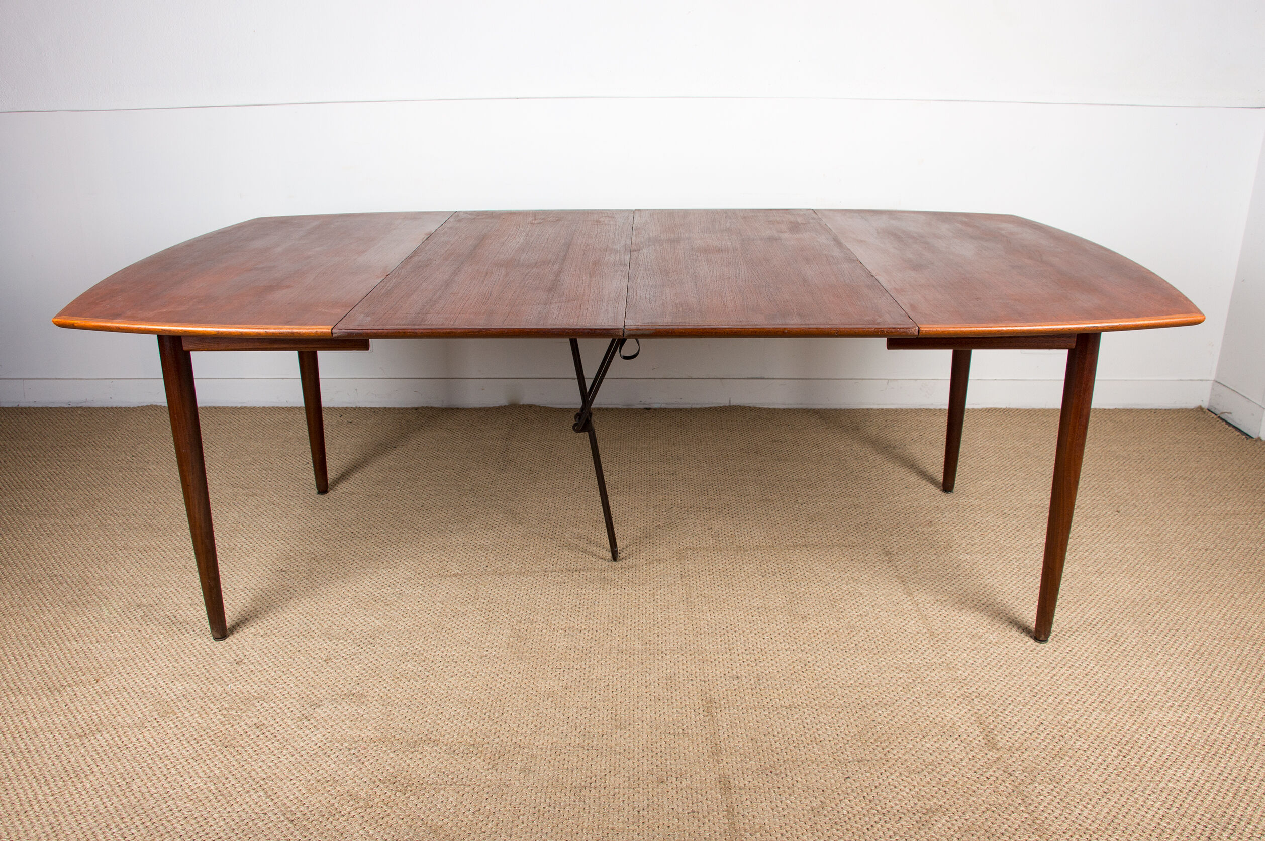 Expandable square teak dining table by Henry Walter Klein 1960