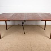 Expandable square teak dining table by Henry Walter Klein 1960
