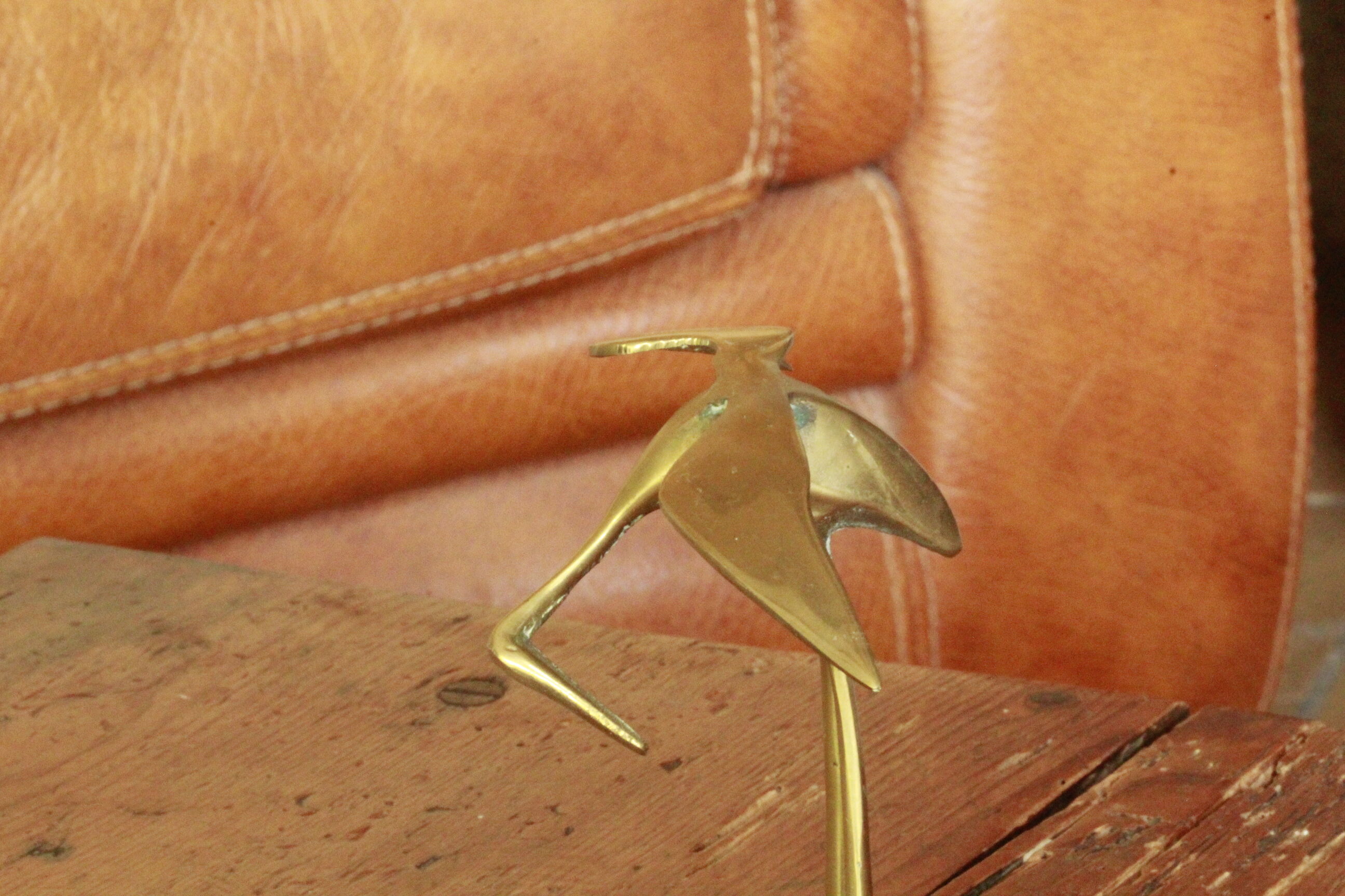 Brass heron statue