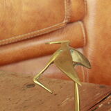 Brass heron statue