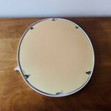 Oval mirror in vintage enameled white cast iron