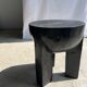 Black mango wood tripod side table with a semi-spherical top, height: 45 cm, diameter: 44 cm.