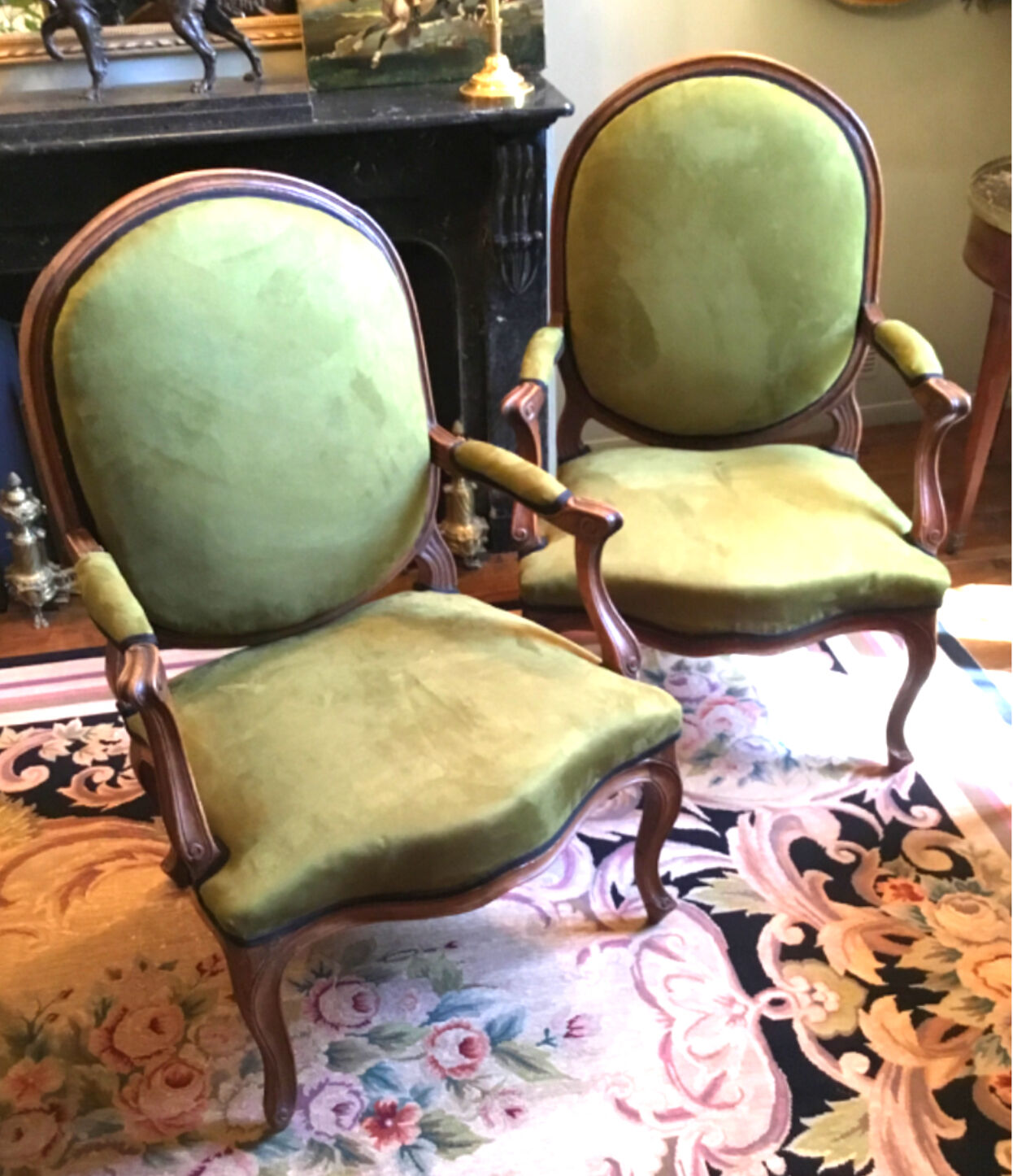 Pair of wide Louis XV armchairs reupholstered to new.