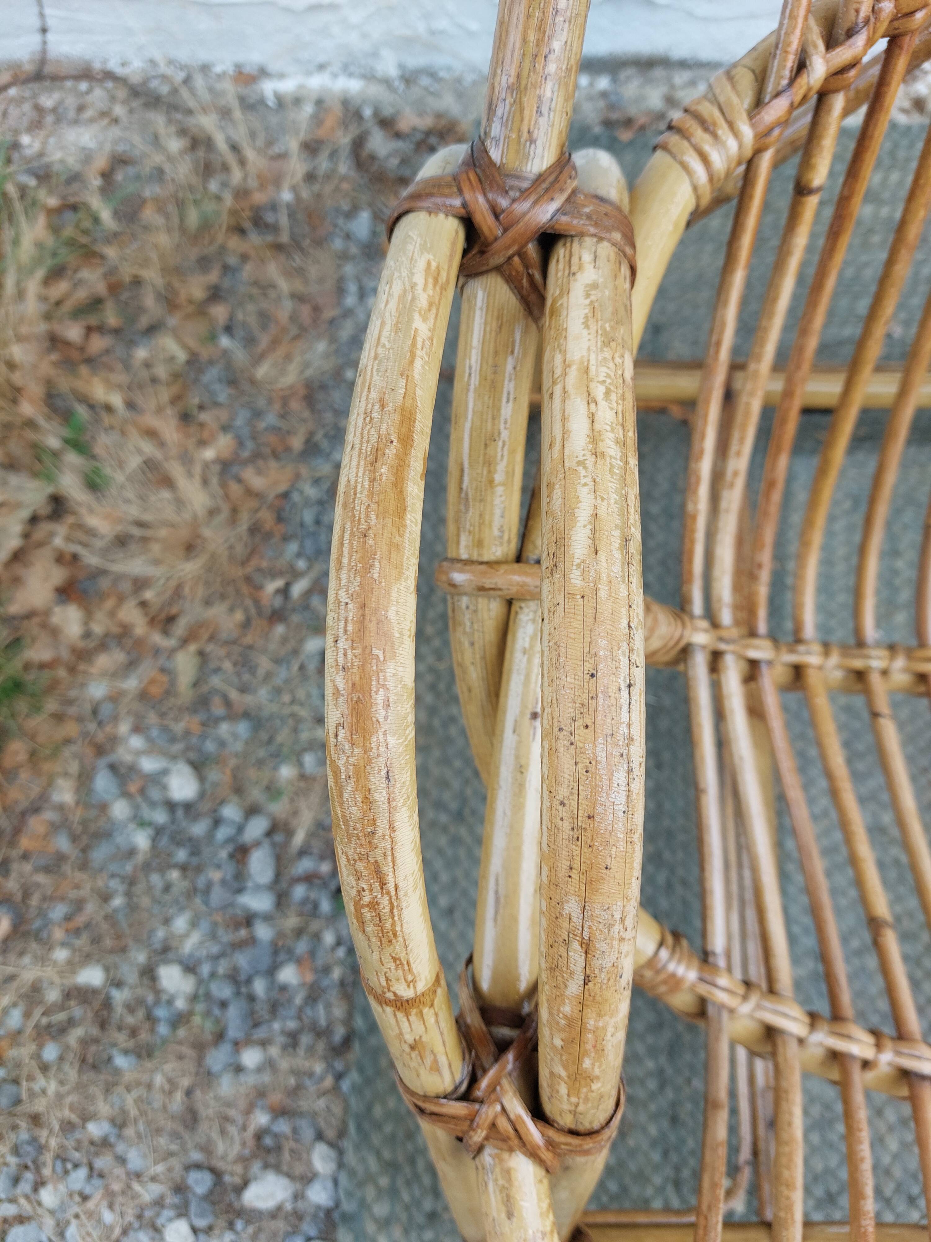 4 armchairs and a coffee table made of rattan and bamboo wood, vintage.