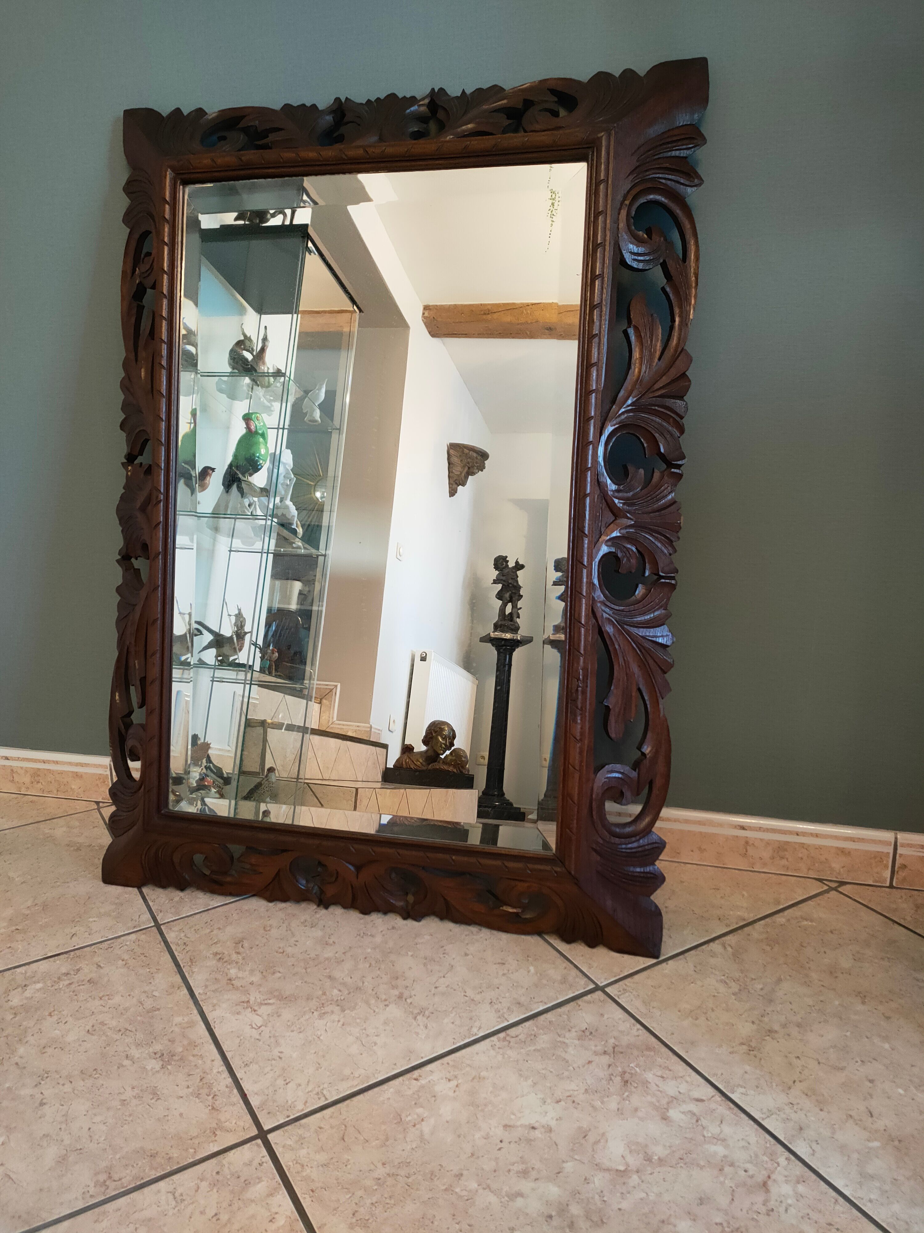 Antique mirror in openwork carved wood