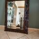 Antique mirror in openwork carved wood