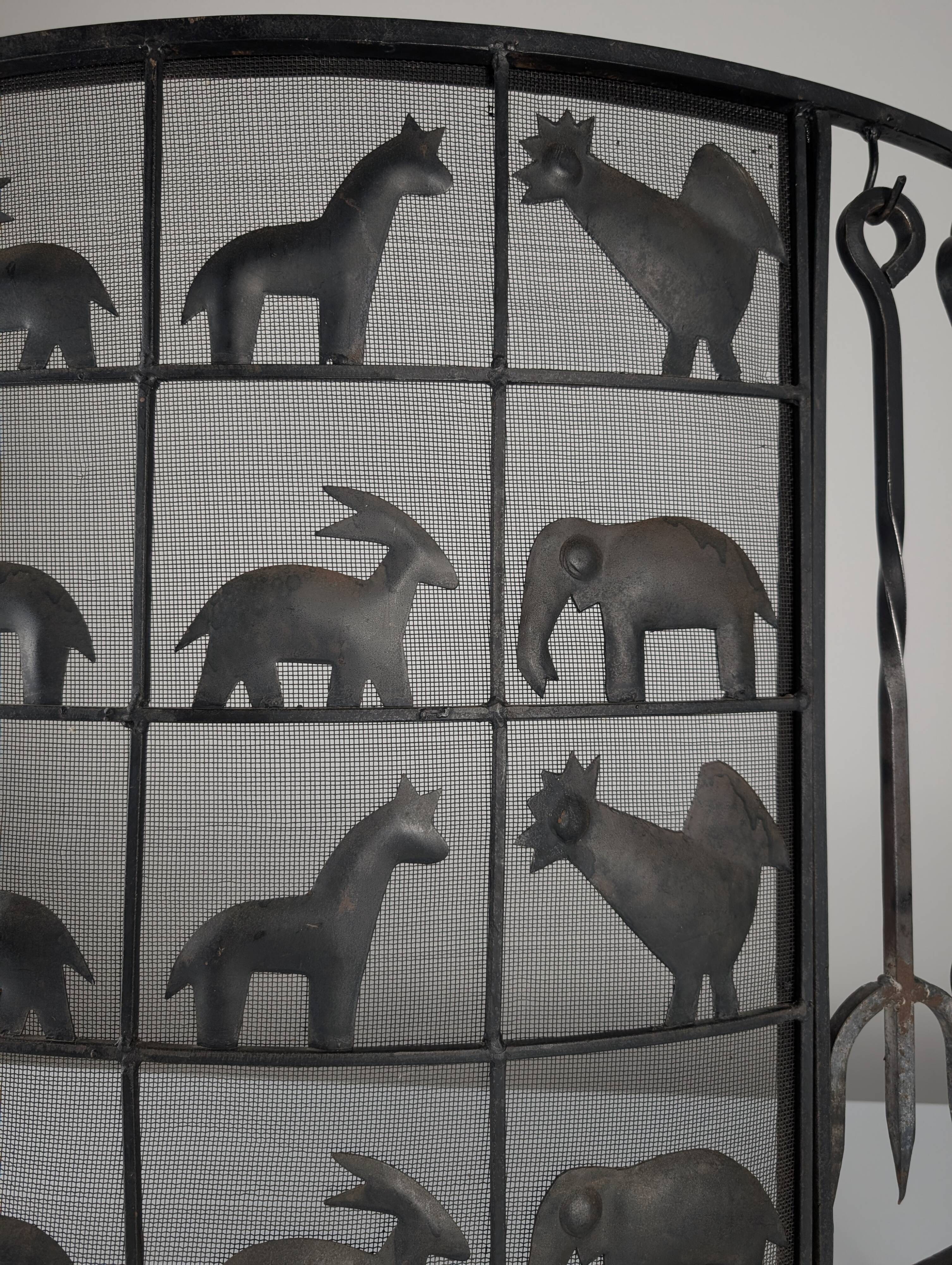 Pare-feu animalier en fer forgé, par Atelier Marolles, années 1950