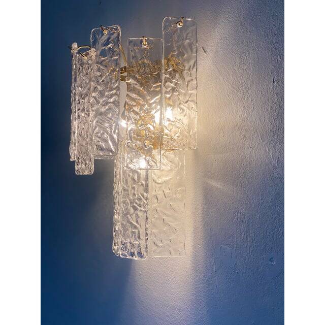Pair of contemporary hammered strips ”listelli” murano glass wall sconces