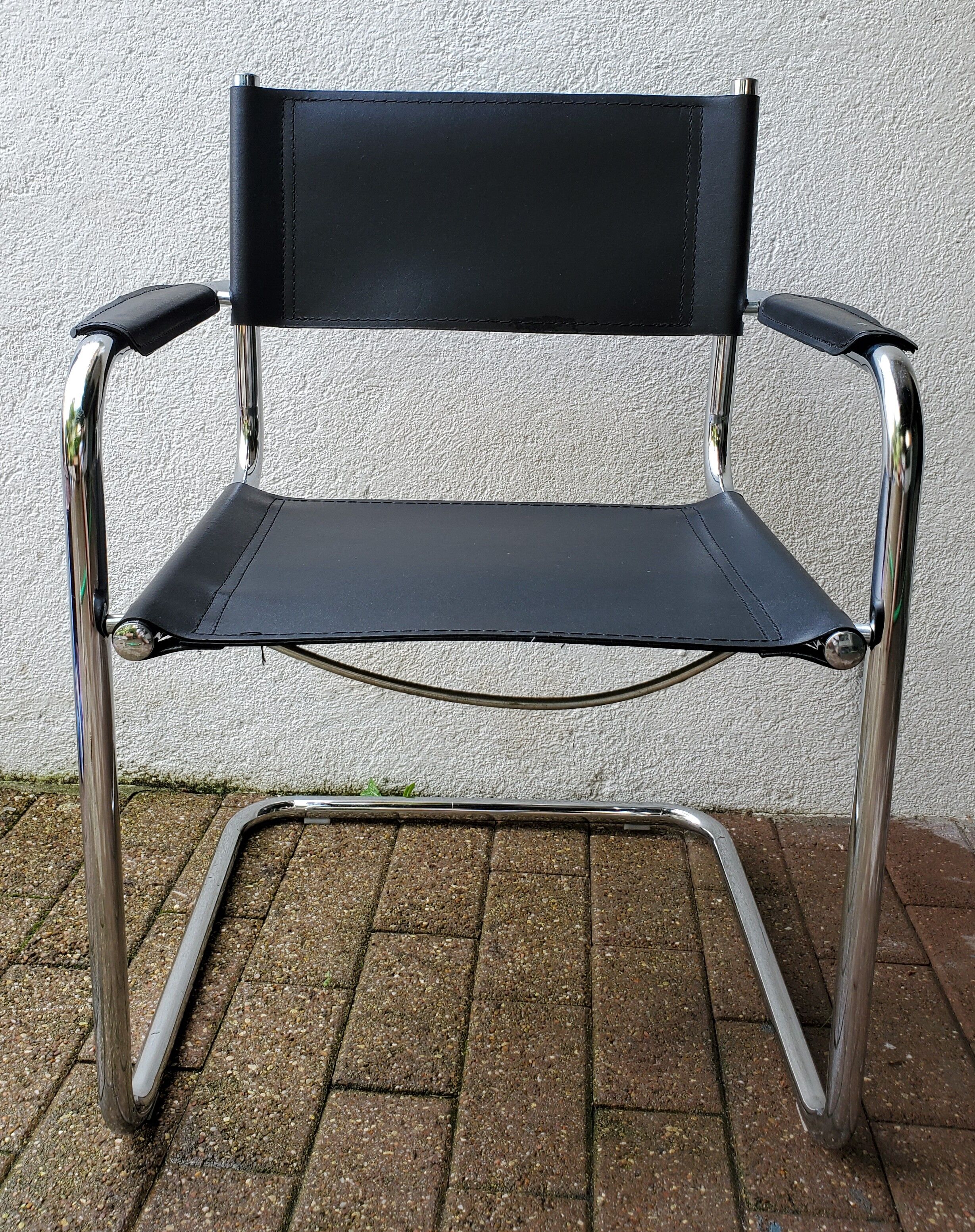 Leather and chrome armchair 70