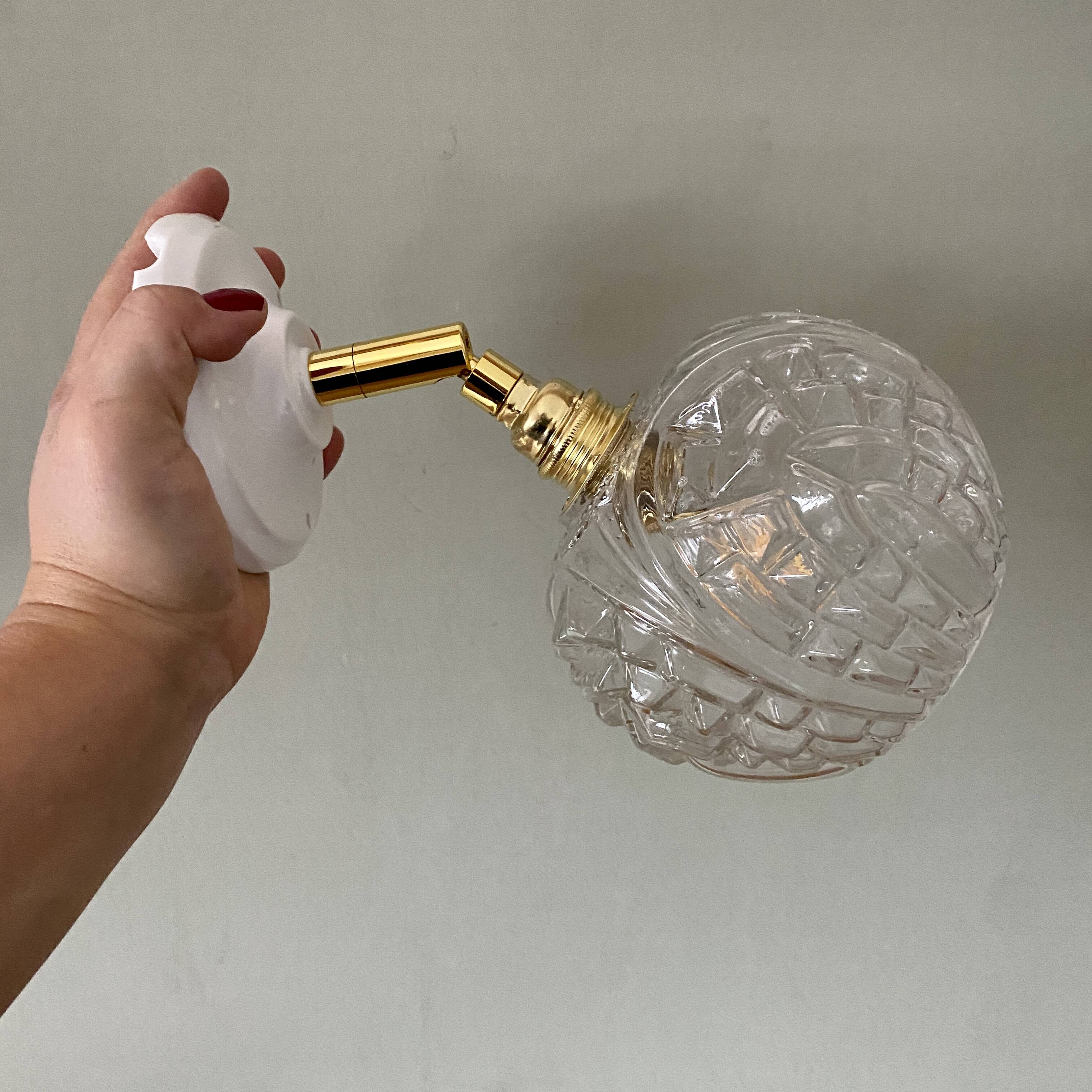 Vintage moulded glass globe wall light