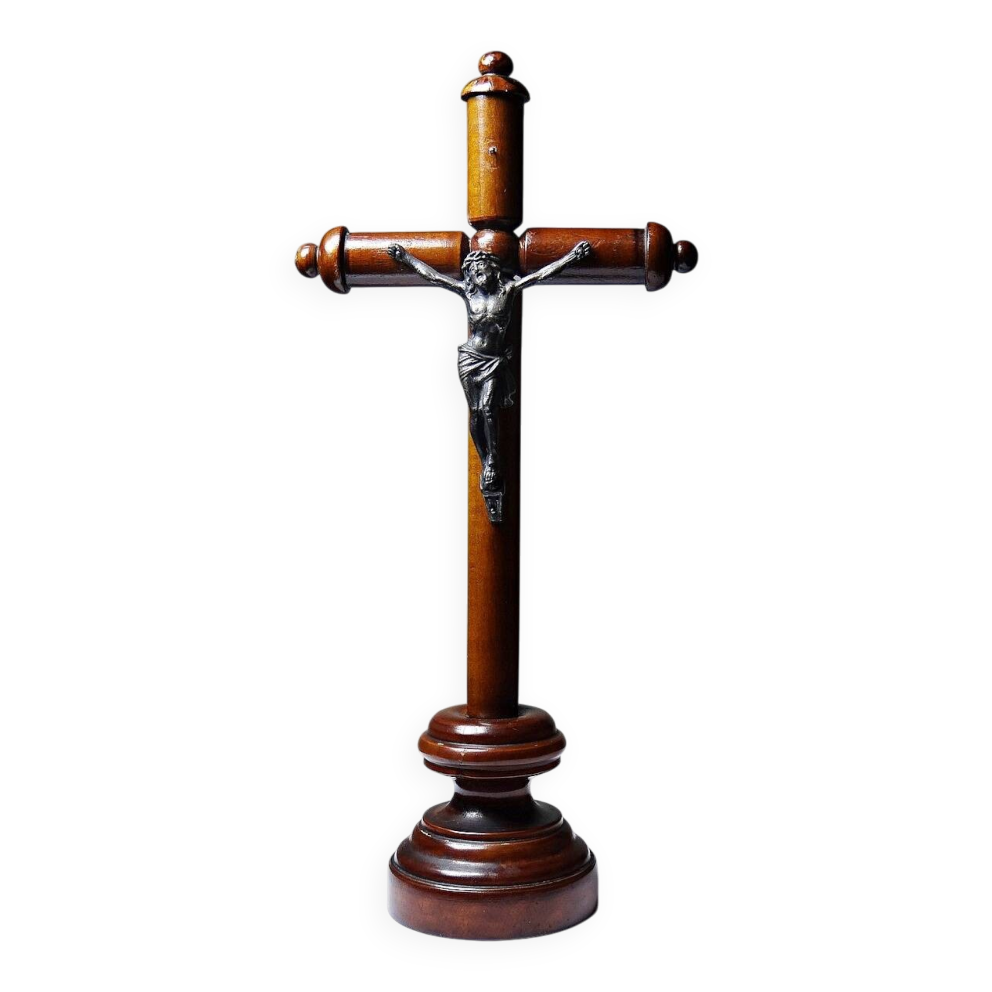 Antique wooden altar crucifix with a turned design and silver-plated Christ.