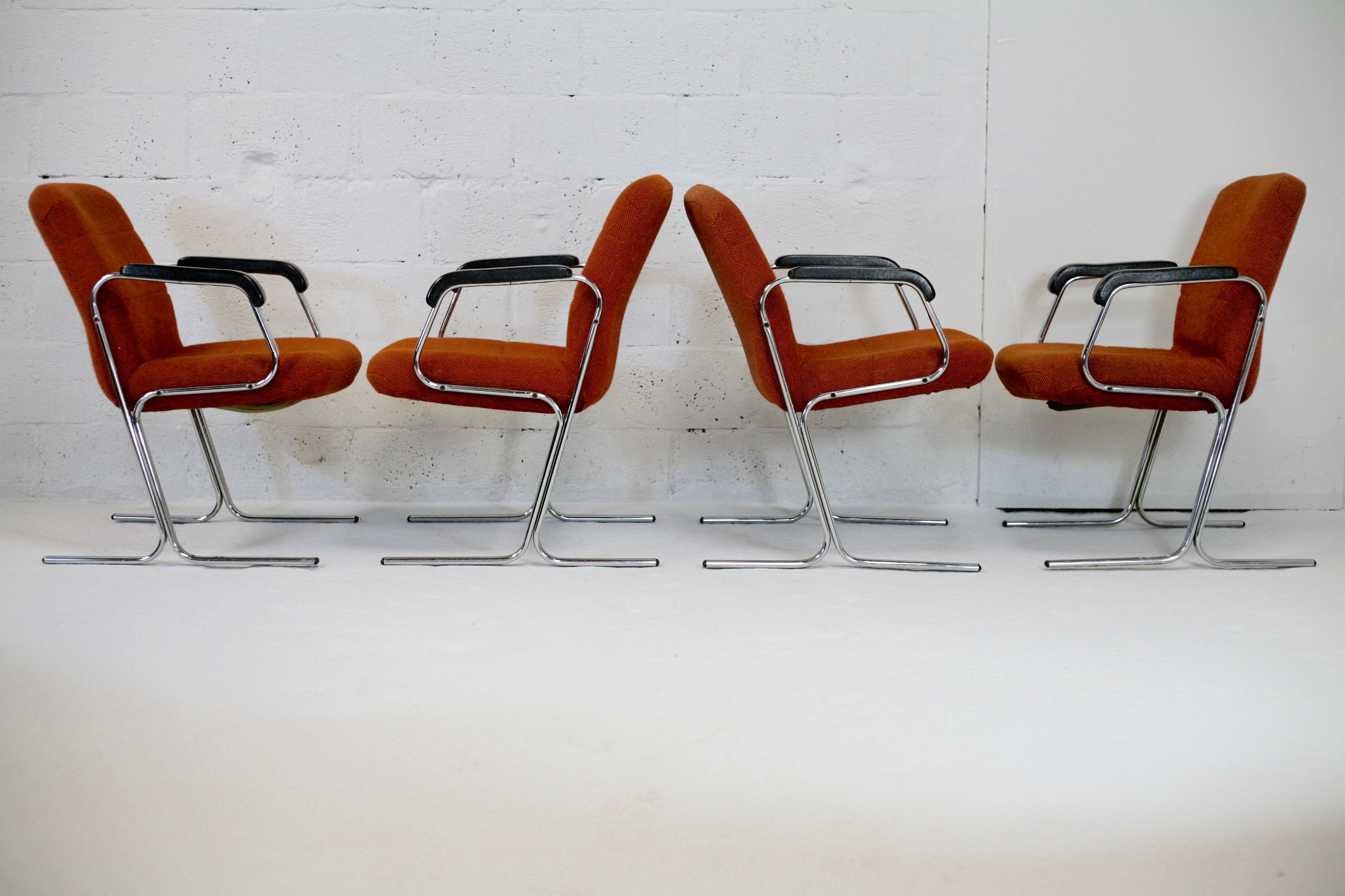 4 "space age" armchairs, chrome steel base