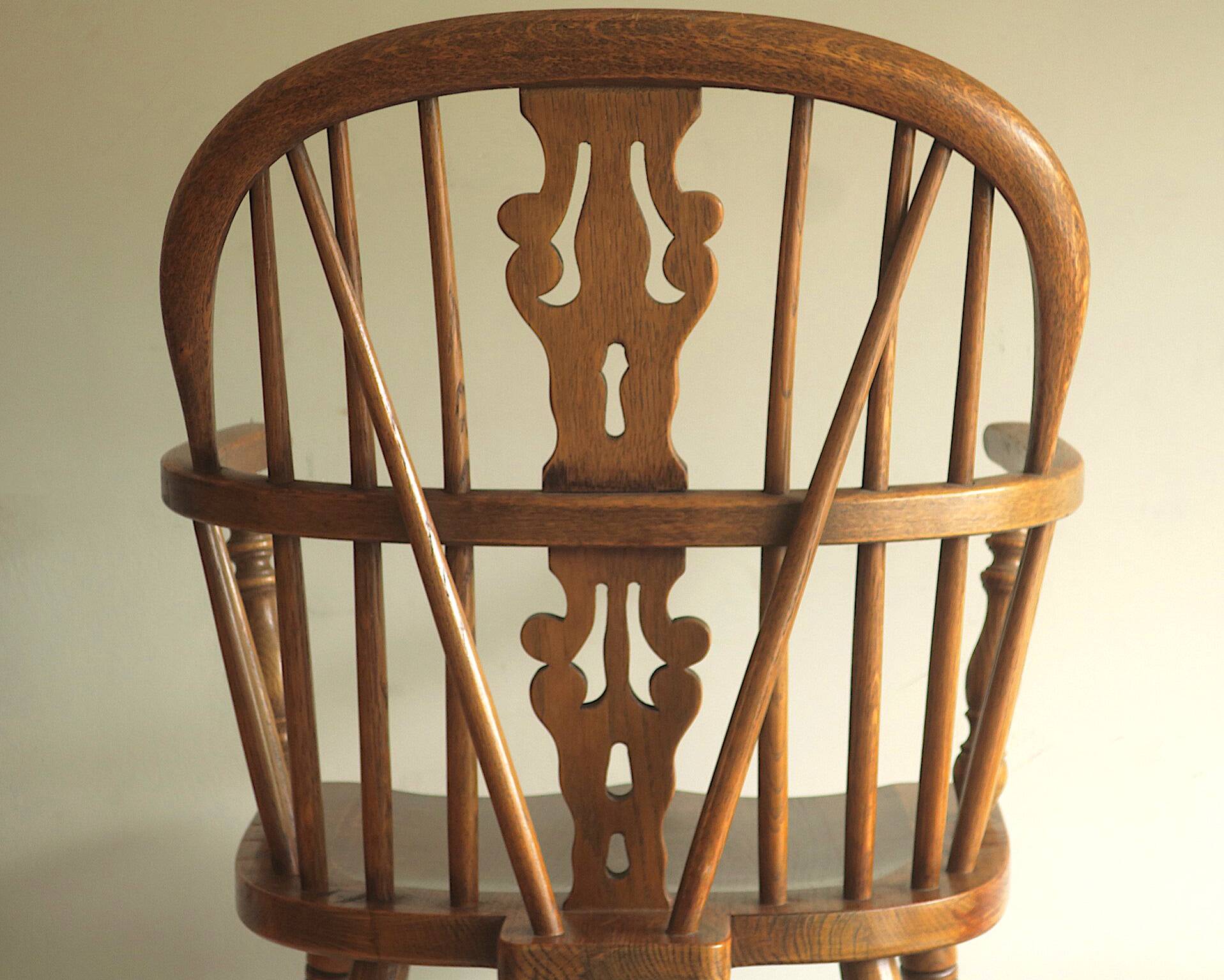 Mid century solid oak lyre-back Windsor elbow armchair, 1960s