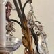 Lustrous chandelier with pendants and glass fruits, Maison Baguès, six lights.