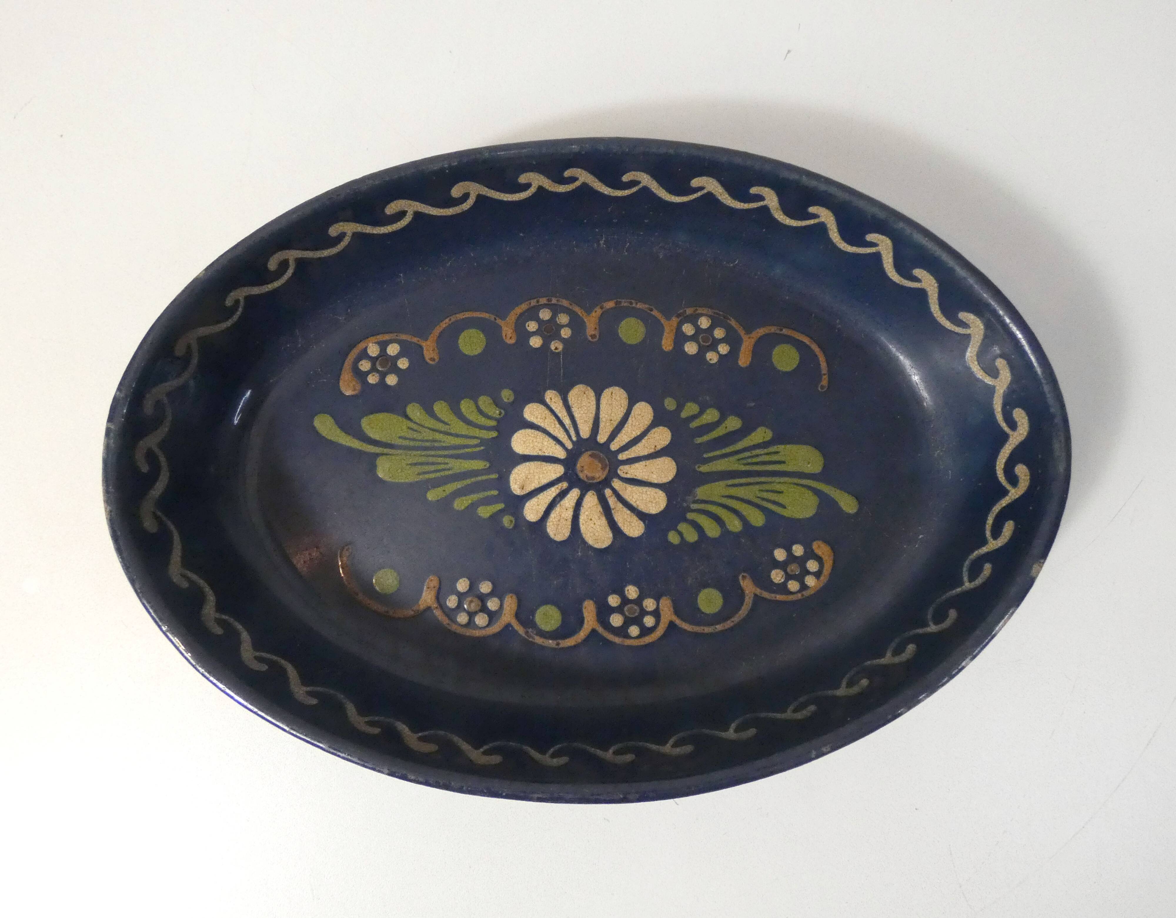 old glazed terracotta dish
