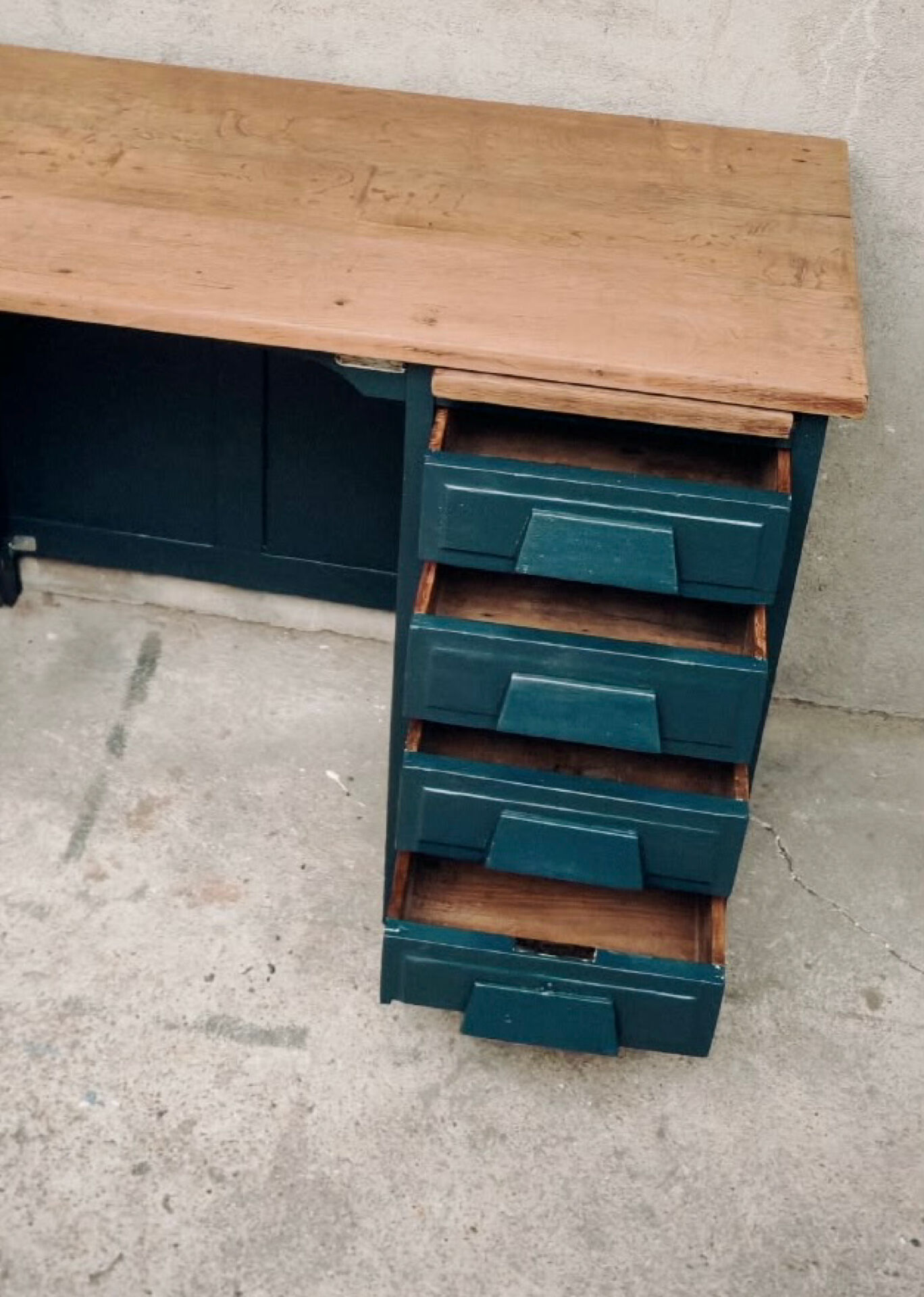 Antique desk with drawers and shelf