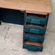 Antique desk with drawers and shelf
