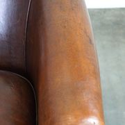 Set of two rugged sheep let of two rugged sheep leather club armchairs with a nice distressed look