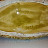 Old barbotine planter with flower patterns