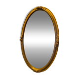 Oval mirror with wooden frame