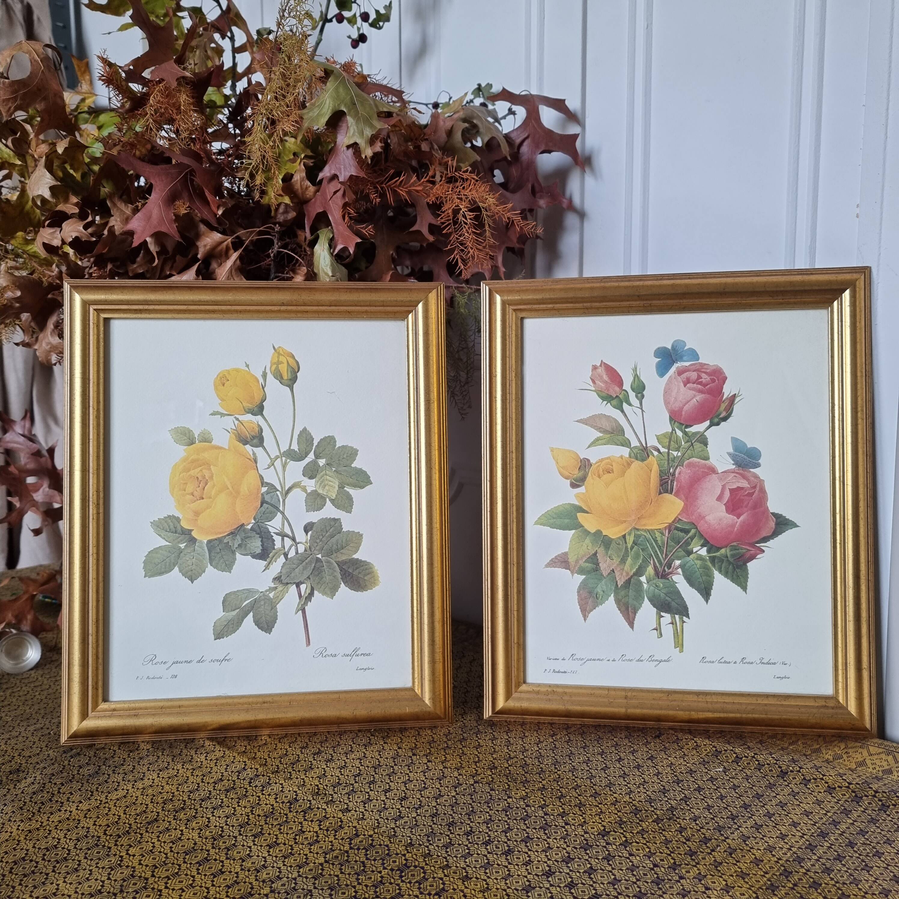 2 paintings with period lithographed flowers and gilded wooden frame.