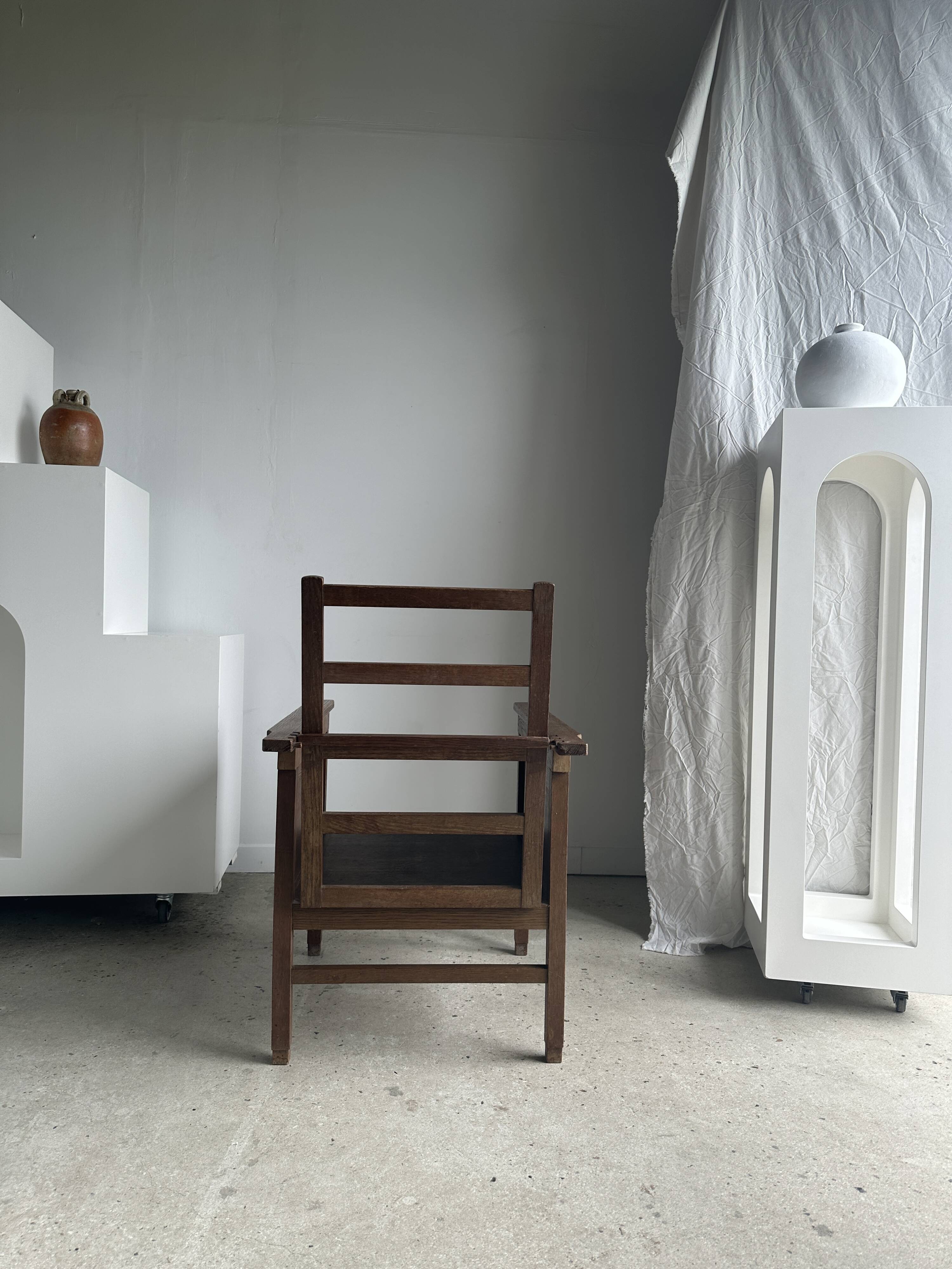 Large wooden armchair with adjustable reclining back