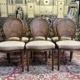 Suite of 6 Louis XVI style chairs in cane and fabric