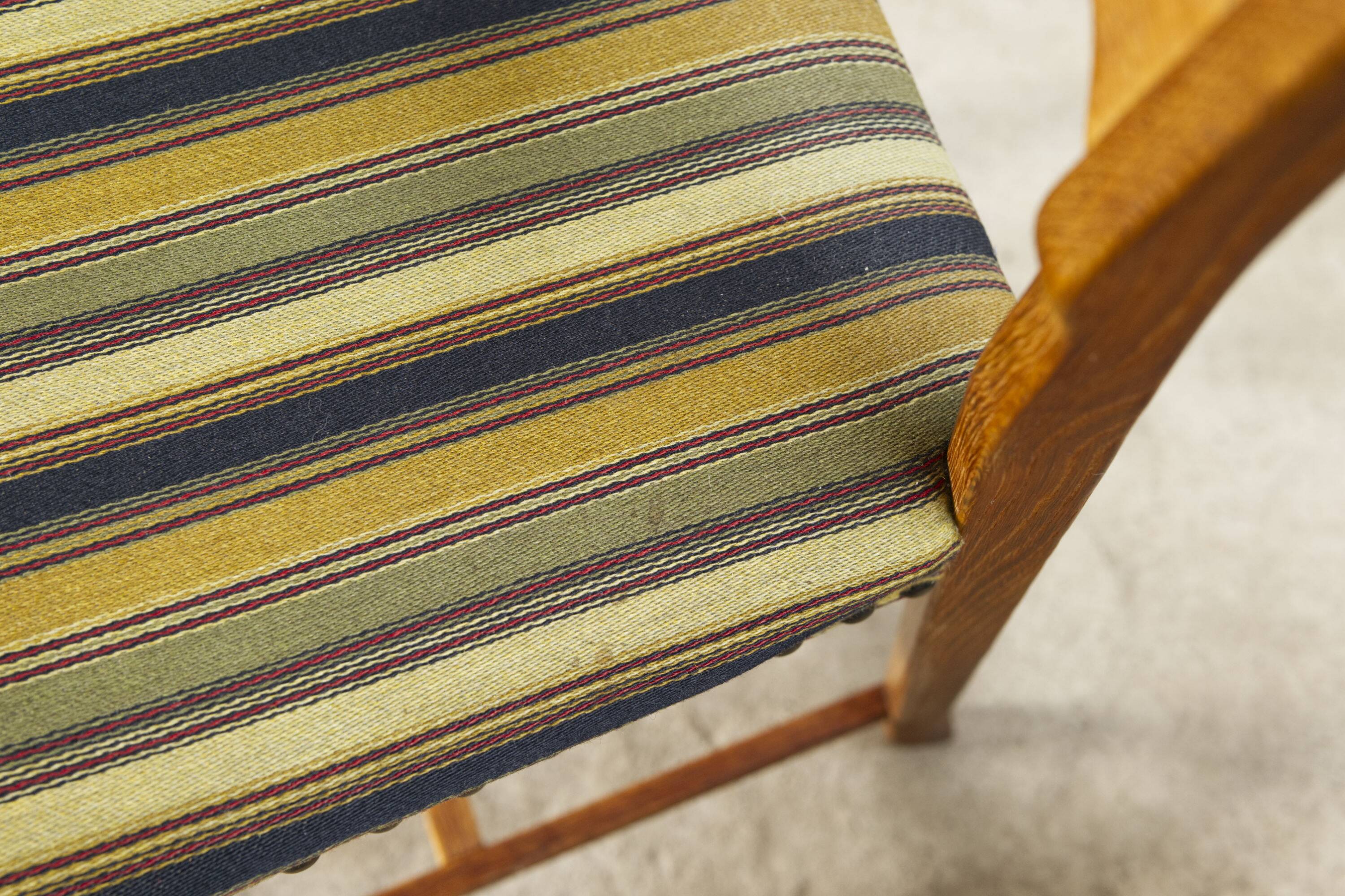 Set of four oak and wool dining room chairs by Henning Kjaernulf, 1960's