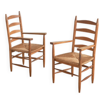 Set of 2 oak and wicker armchairs, mid-20th century.