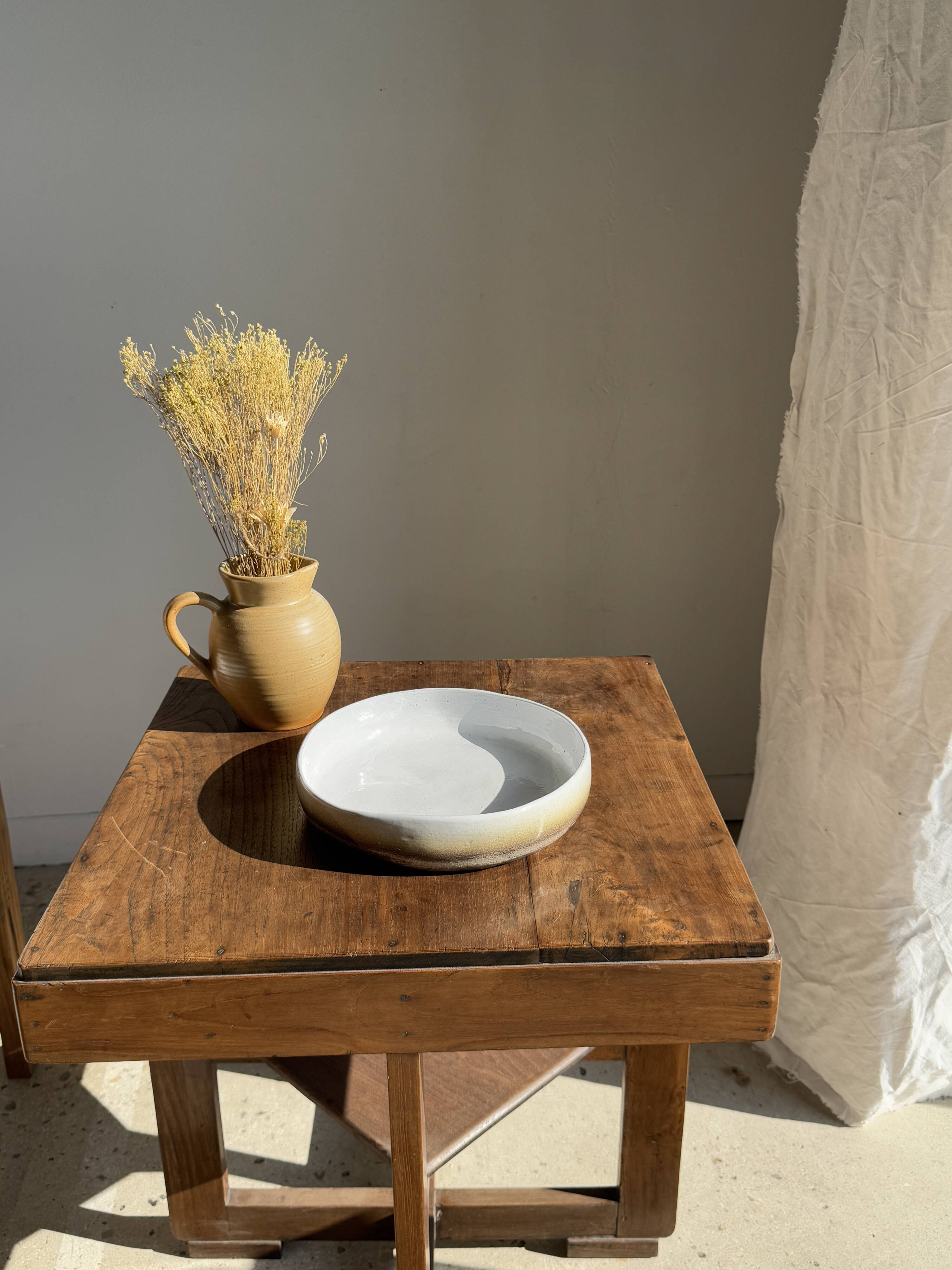 Large white and earthenware ceramic dish