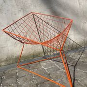 Orange lattice armchair