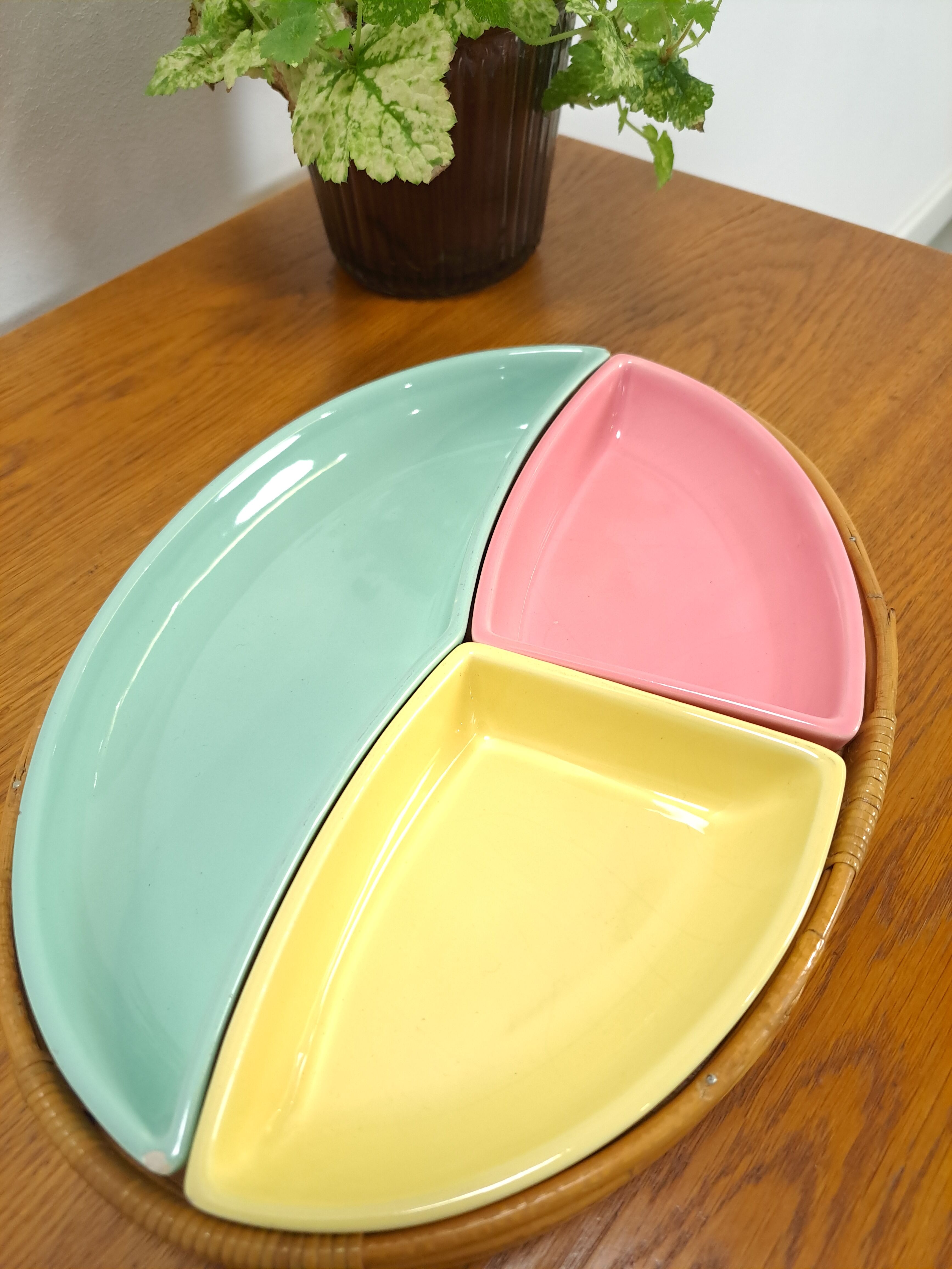 Pastel color bowls set in rattan basket vintage