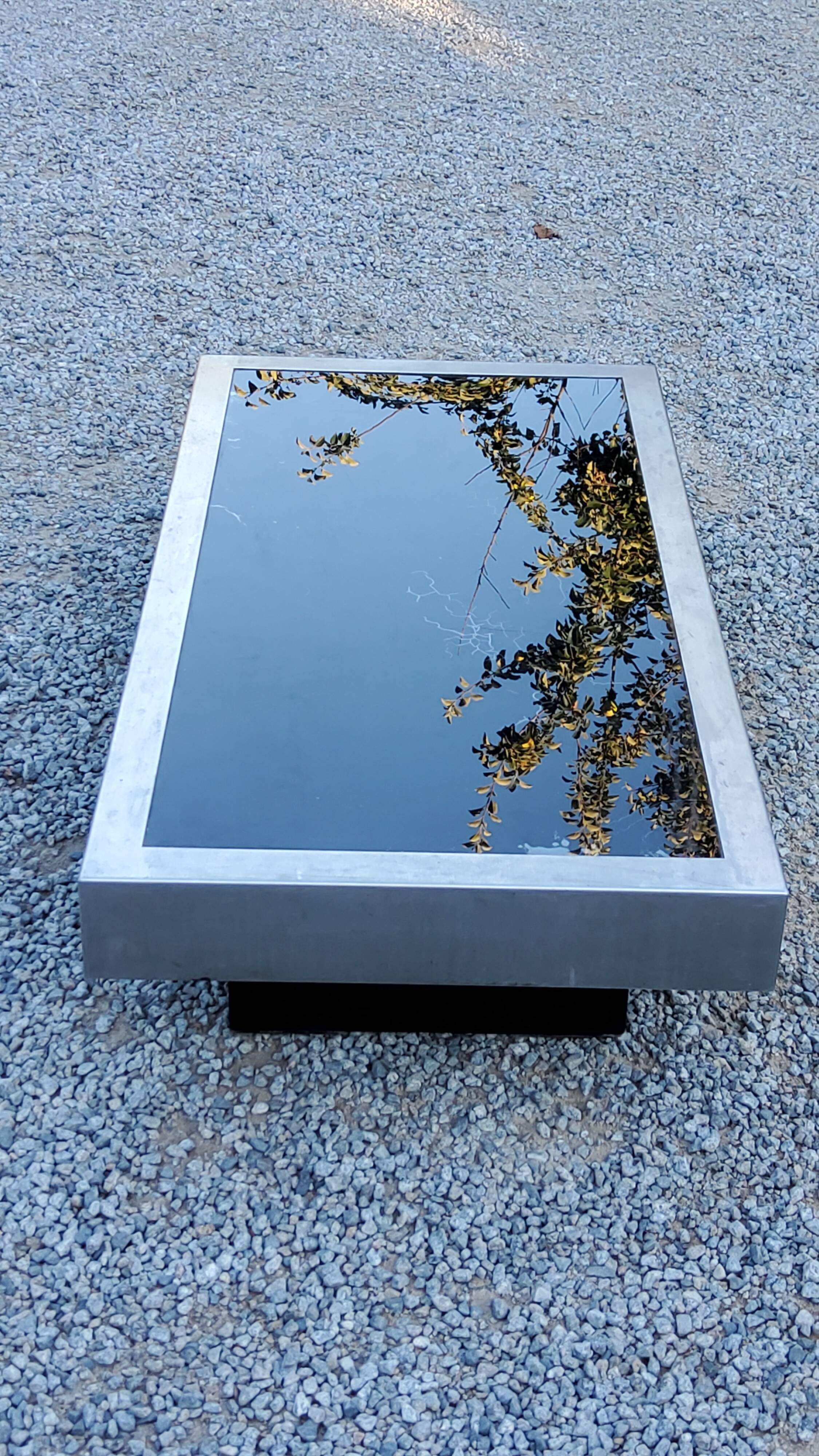 Coffee table in brushed steel and black tinted glass from the 70s