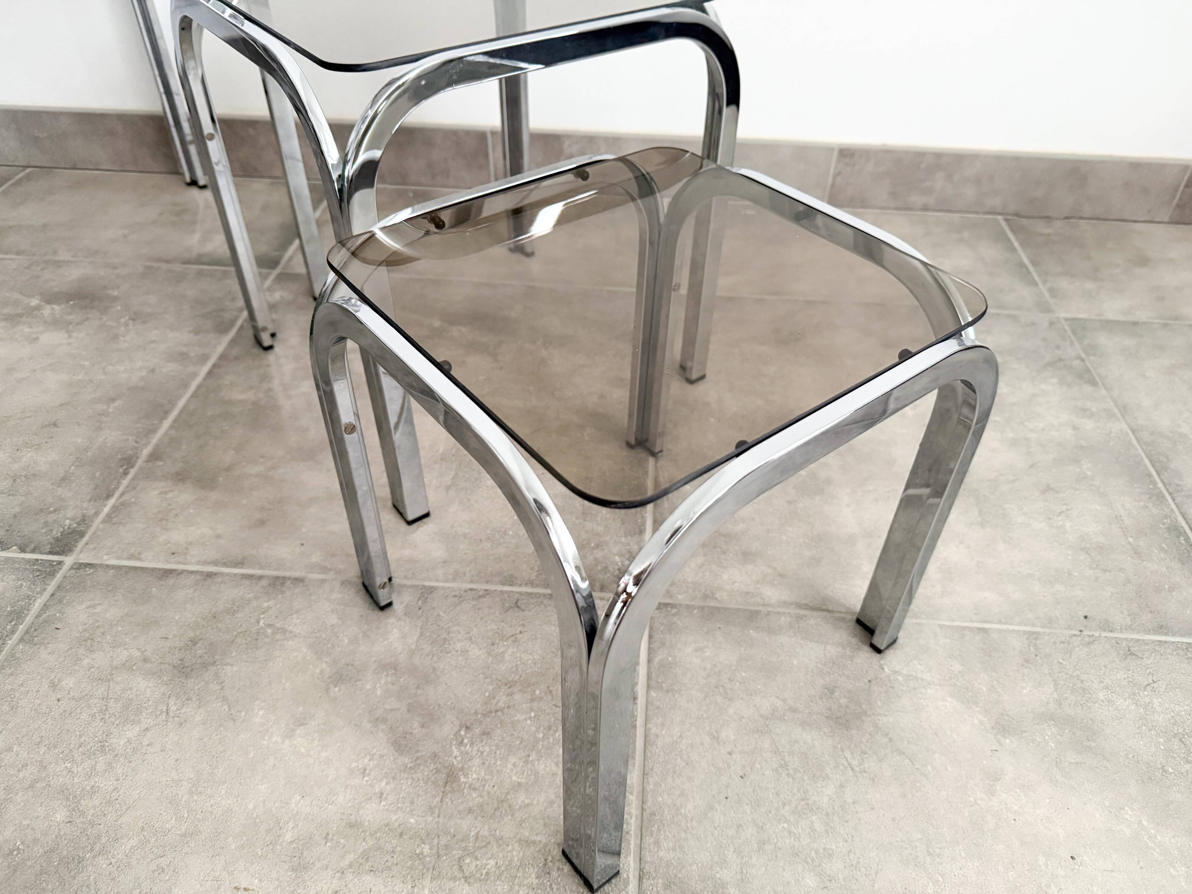 Set of 3 nesting tables, chrome and smoked glass, 1970s.