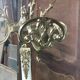Coat holder on onyx and gold metal foot