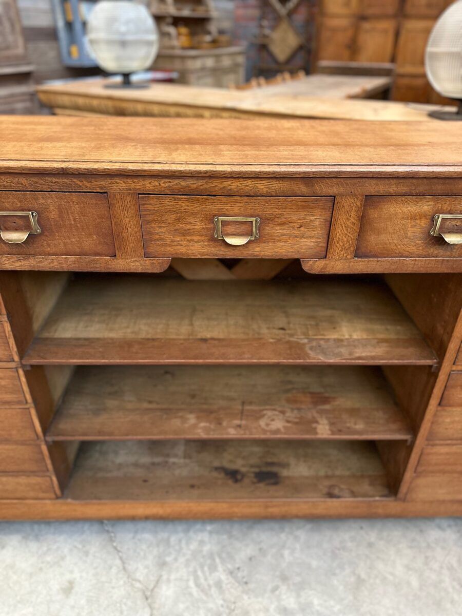 Early 20th-century oak hardware counter